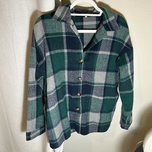 Plaid shirt with pockets.